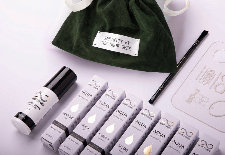 Aqua Drops® Silver Kit: 7 hybrid brow dye shades in boxes, liquid brow tint developer, mapping pen and velvet bag, Infinity by The Brow Geek